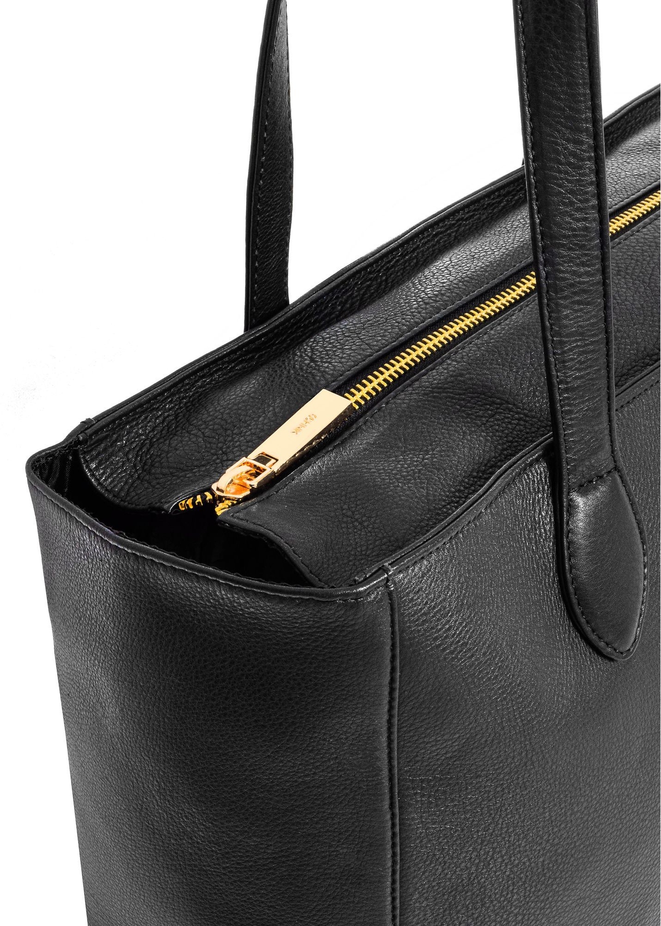 Czarna skórzana torebka shopper damska TORES-0971E-99(Z25) - zbliżenie na detal na białym tle.