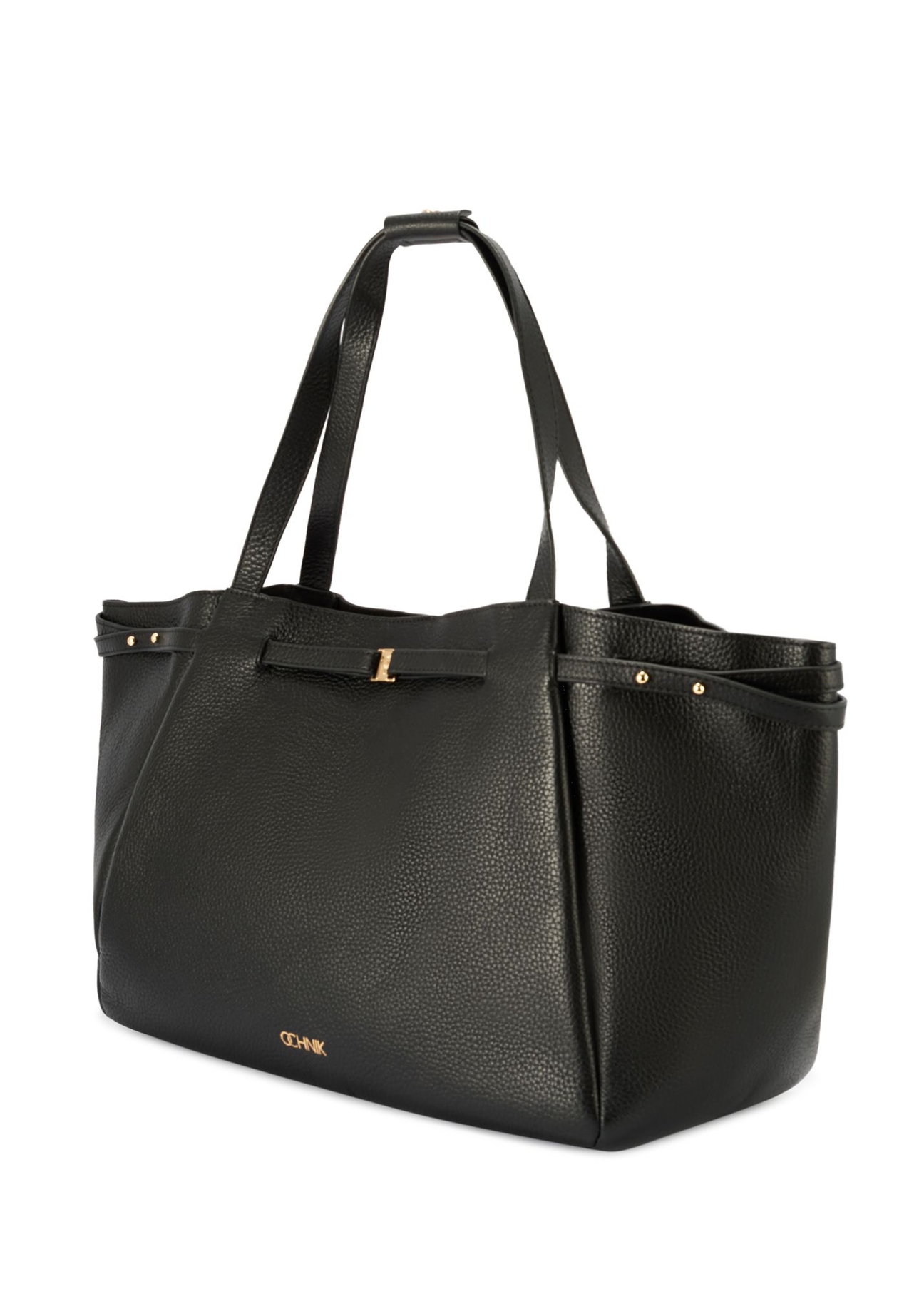 Skórzana torebka shopper w kolorze czarnym TORES-1207-9I(W26) - widok produktu po skosie, na białym tle. 