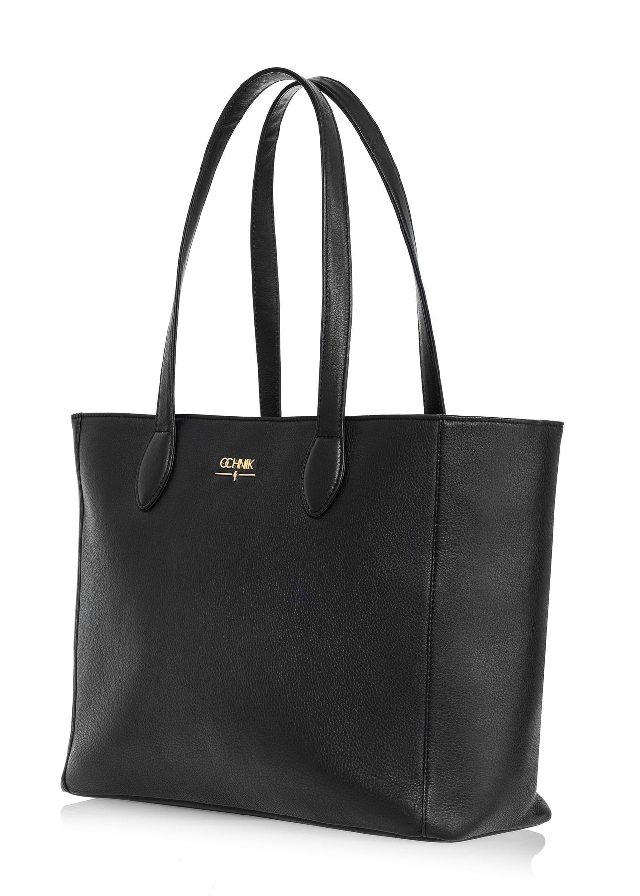 Czarna skórzana torebka shopper damska TORES-0971E-99(Z25) - widok skosu na białym tle.