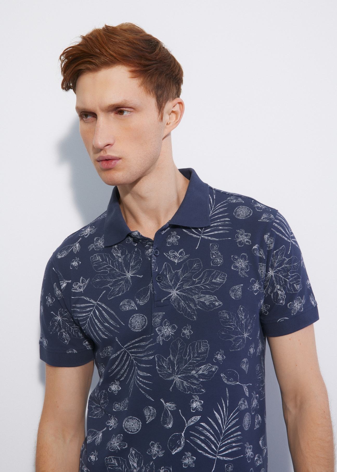 Granatowa wzorzysta koszulka polo POLMT-0057-69(W23)-01