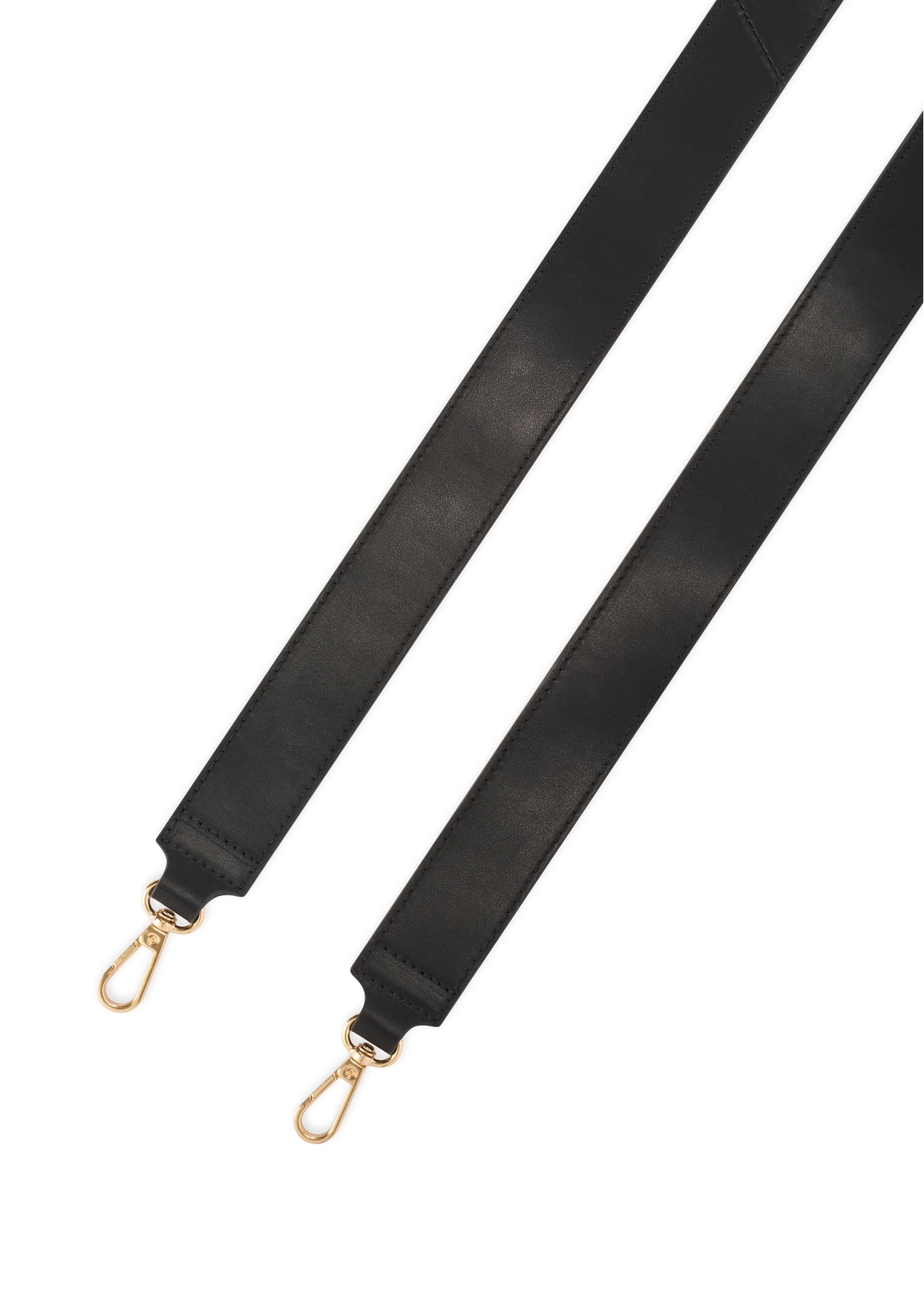 Czarna skórzana torebka damska TORES-1261-99(W26) - widok na paski, na białym tle. 