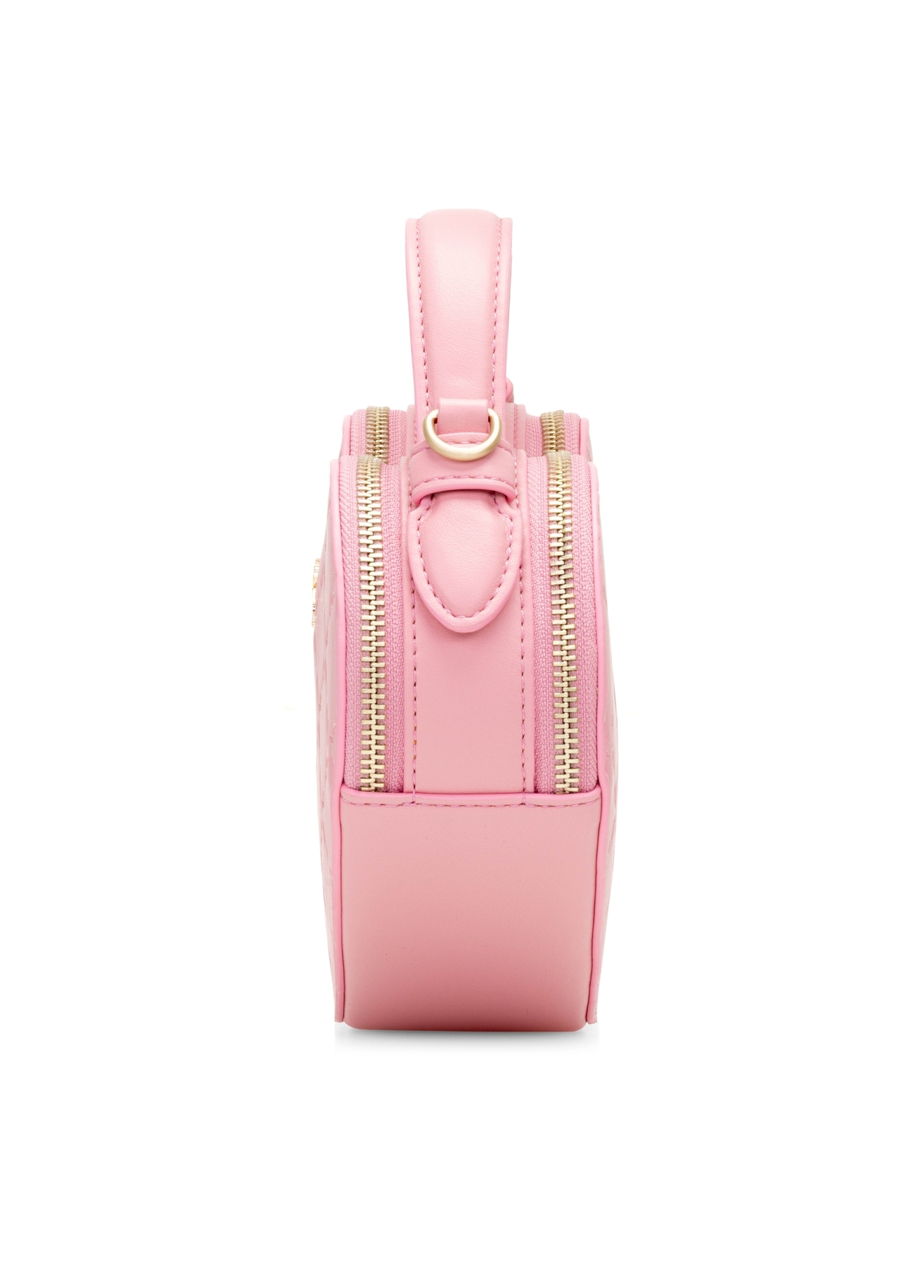 Różowa torebka w kształcie serca TOREC-1154-5B(W26), widok produktu od boku na białym tle.