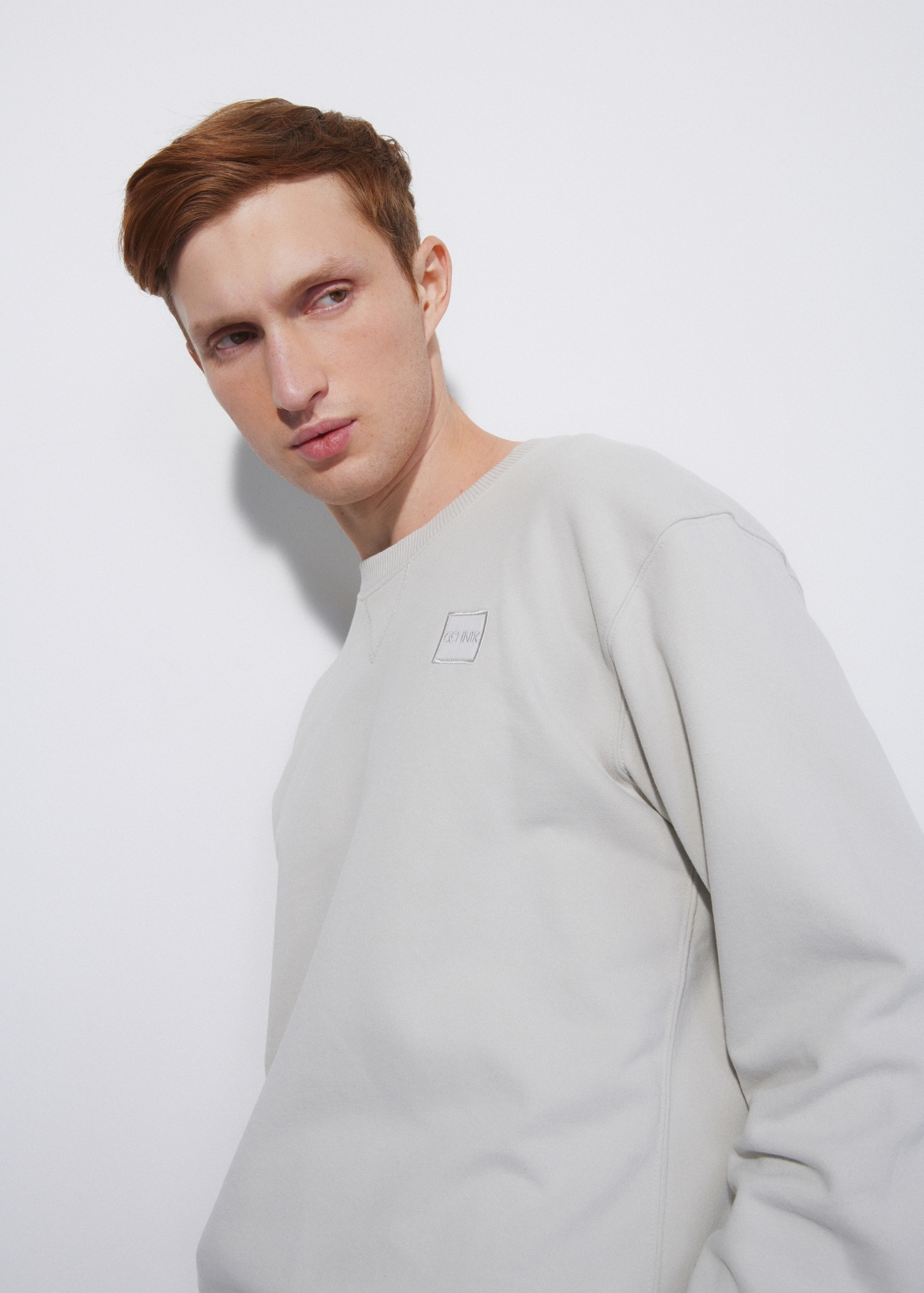 Kremowa bluza męska z logo BLZMT-0057-66(W23)-01