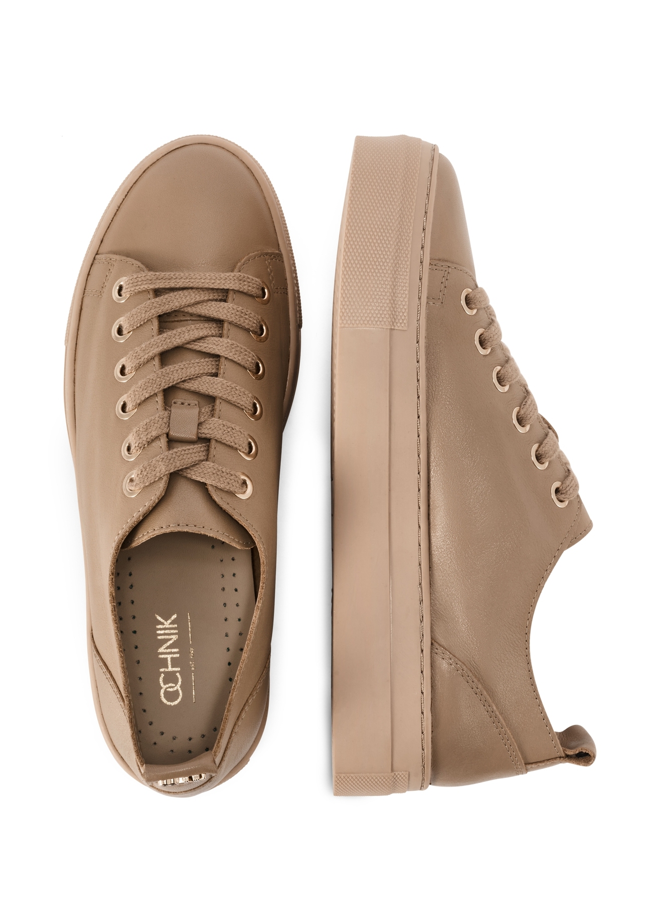 Skórzane tenisówki damskie w kolorze beżowym BUTYD-1062-1B(W26) - widok produktu z przodu z góry, na białym tle. 