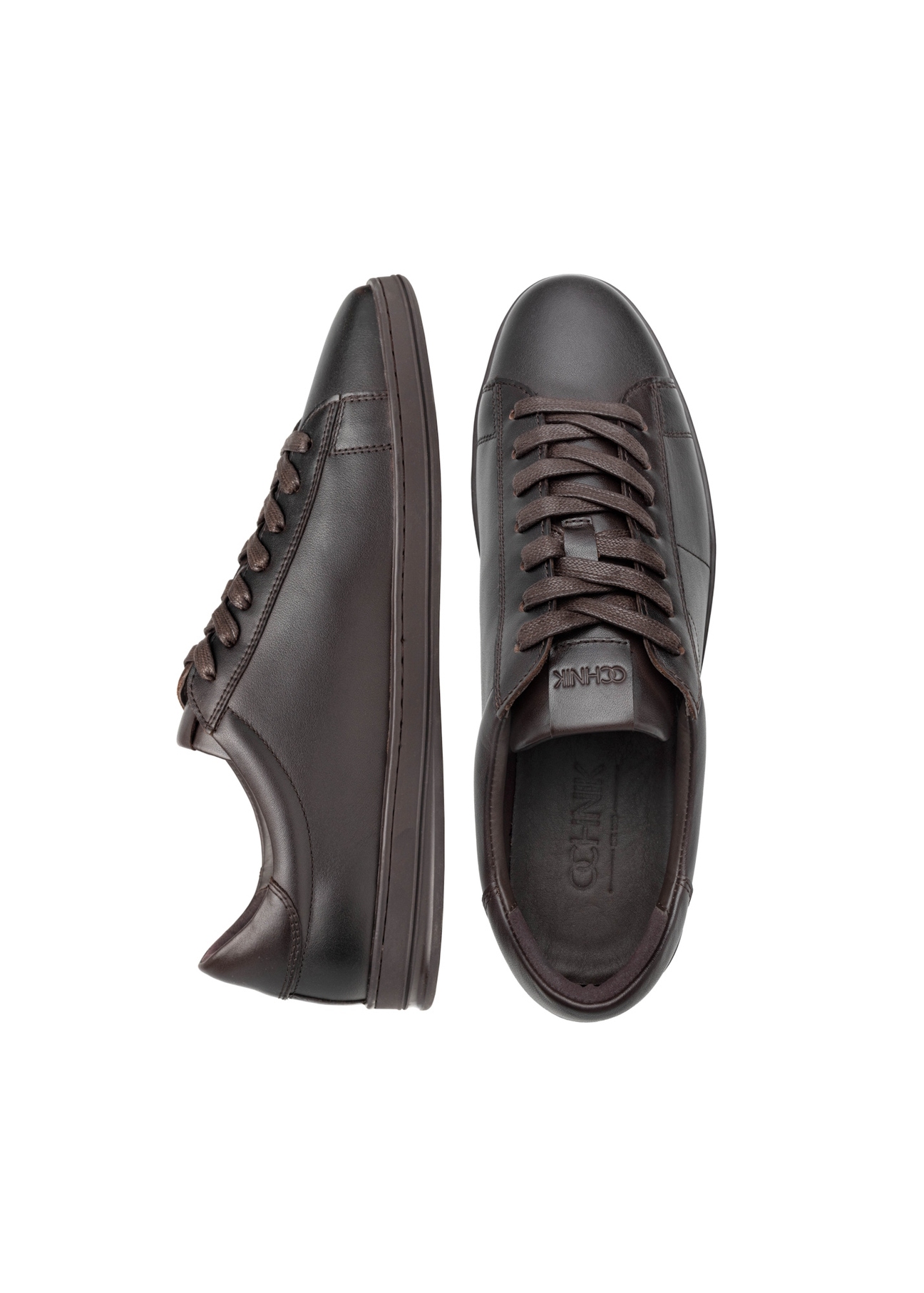 Brązowe skórzane buty męskie BUTYM-0490-1I(W26), widok produktu z góry na białym tle.