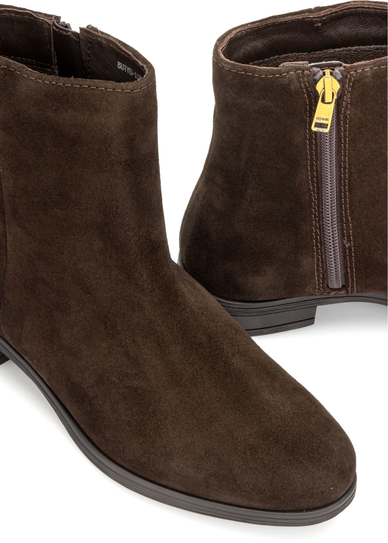 Brązowe skórzane botki damskie BUTYD-1193-89(Z25), zbliżenie na detal produktu, widok na białym tle.