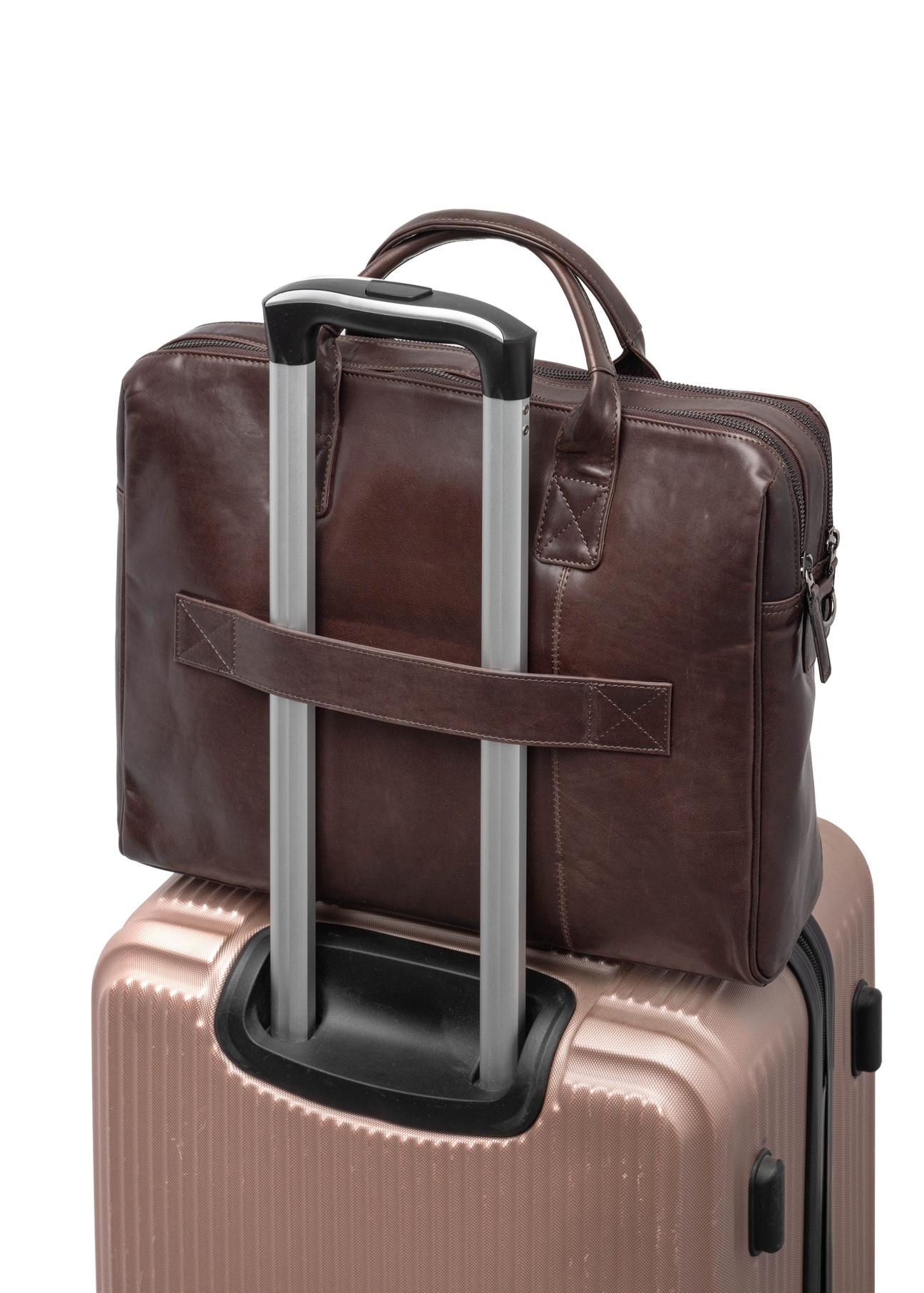 Brązowa skórzana torba męska TORMS-0460-89(Z25), widok produktu od tyłu na walizce na białym tle.