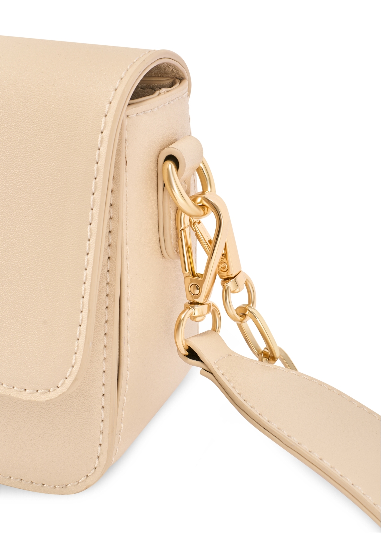 Mała kremowa torebka damska TOREC-1171-0B(W26), zbliżenie na detal produktu, widok na białym tle.