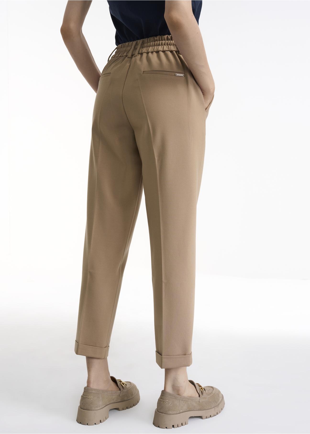 Beżowe spodnie z kantem damskie SPODT-0076-81(Z22)-03