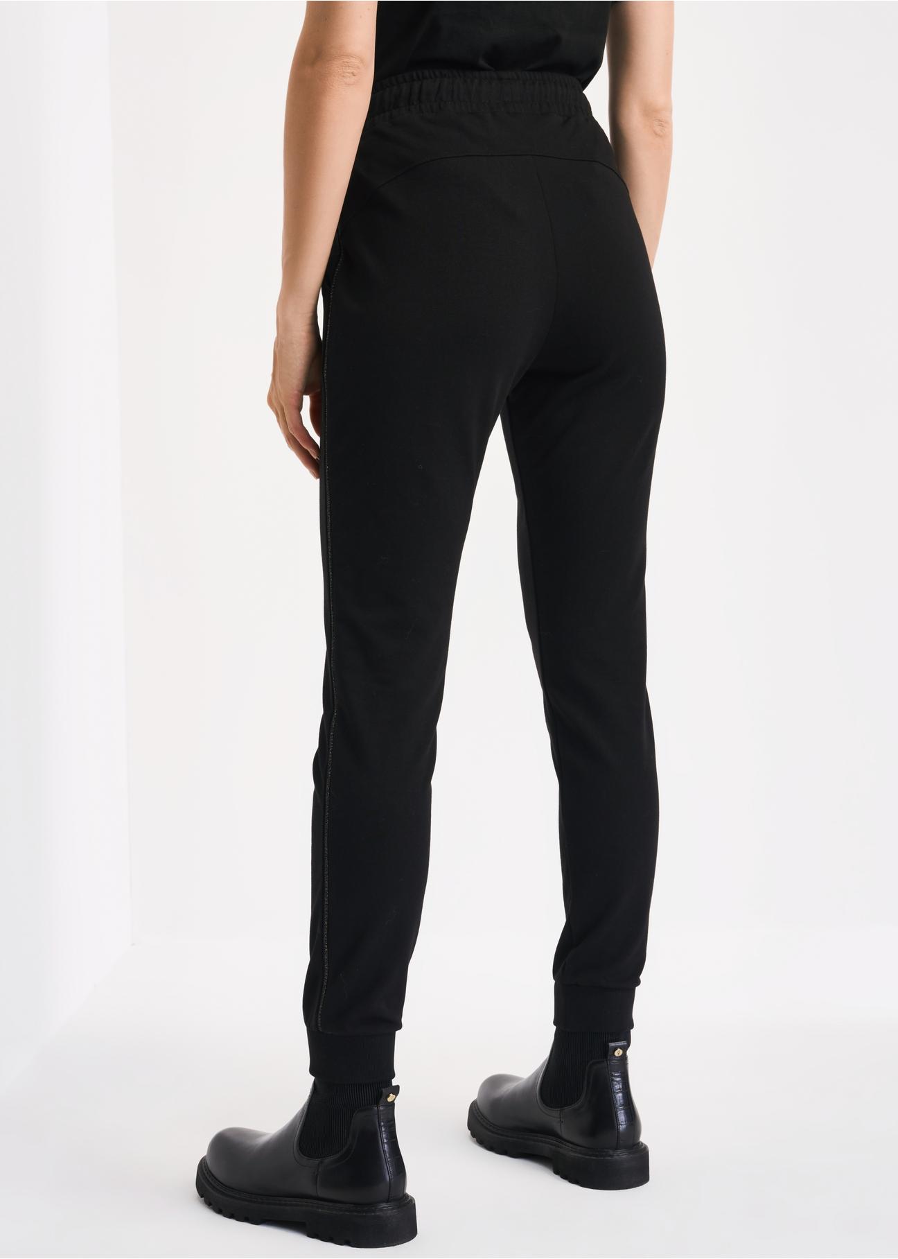 Czarne spodnie dresowe damskie SPODT-0069-99(Z22)-04