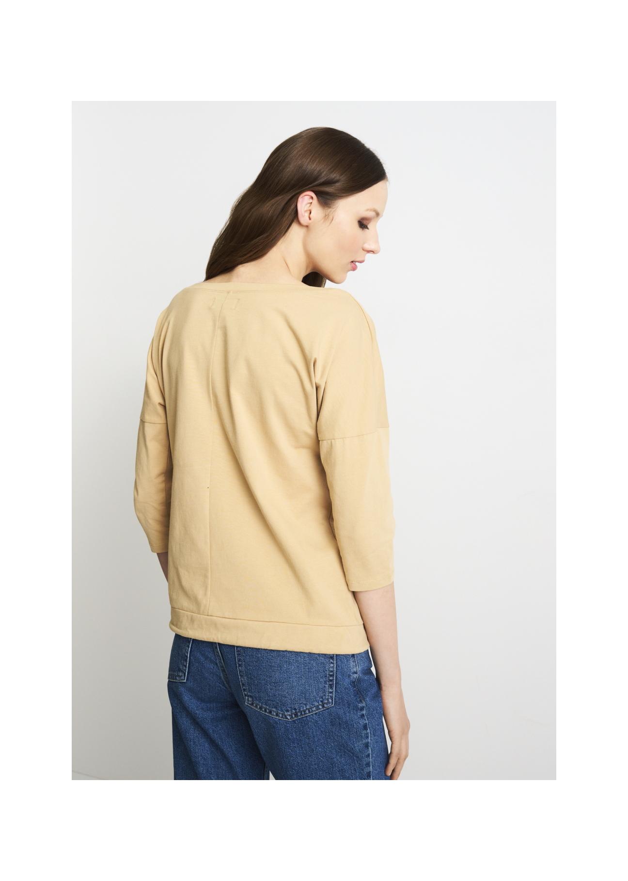 Beżowa bluzka damska z logo OCHNIK BLUDT-0146-80(W22)