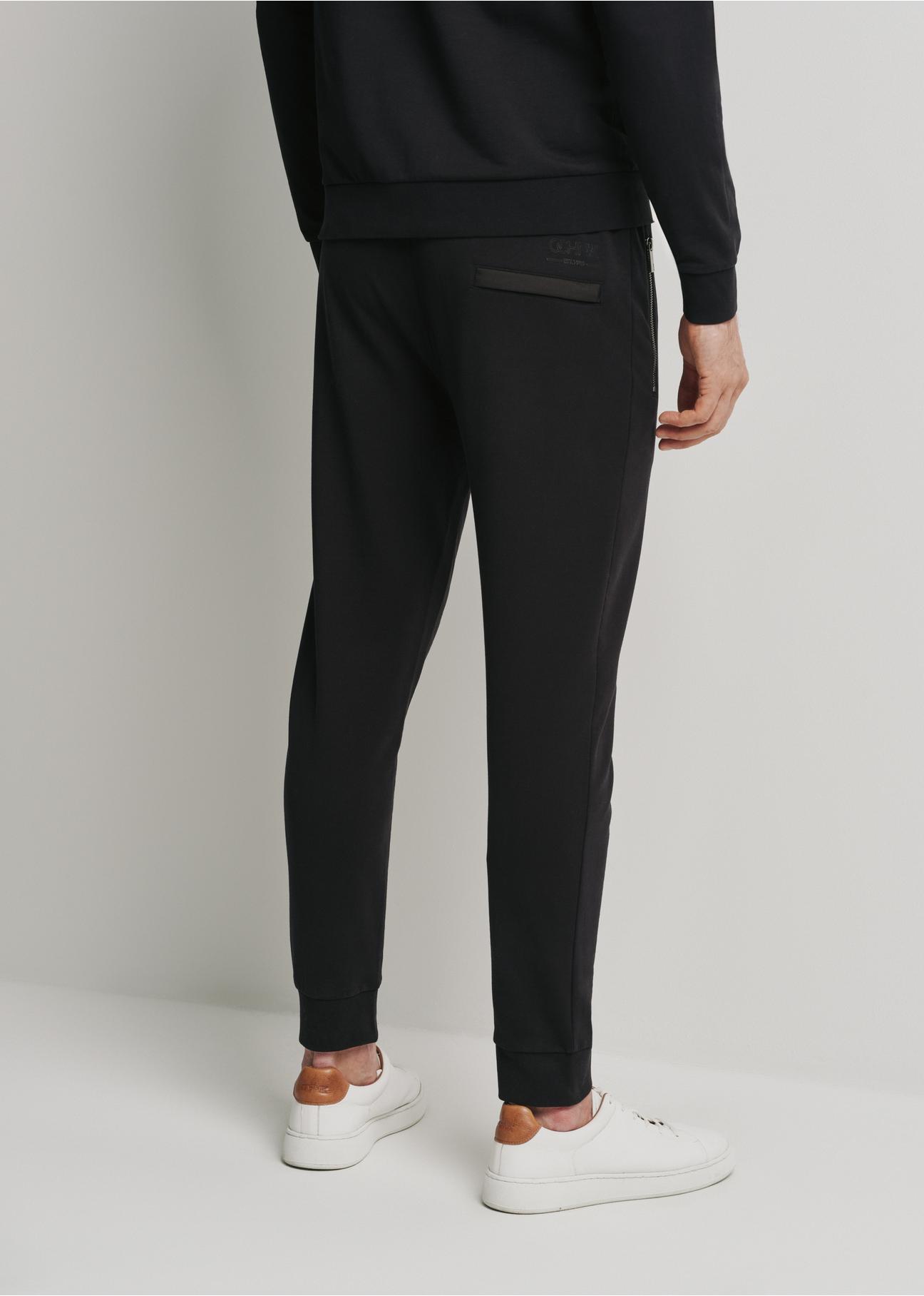 Czarne spodnie dresowe męskie SPOMT-0092-99(W24)