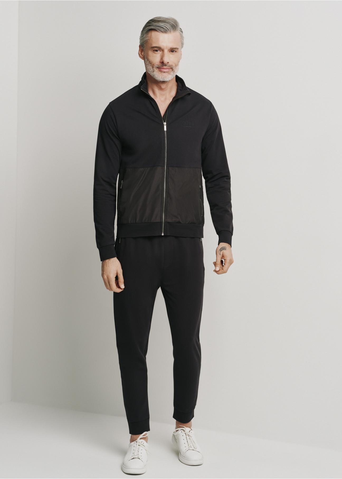 Czarne spodnie dresowe męskie SPOMT-0092-99(W24)