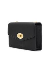 Czarna mała torebka damska TOREC-1141-9I(W26), widok produktu skosem na białym tle.