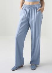 Błękitne szerokie spodnie dresowe damskie SPODT-0068-62(W22)