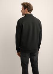 Rozpinana czarna bluza męska ze stójką BLZMT-0082-99(Z26), widok produktu z tyłu na modelu. Widoczna połowa sylwetki.