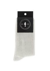 Srebrne błyszczące skarpety damskie SKADT-0074-92(Z25), widok produktu w opakowaniu na białym tle.