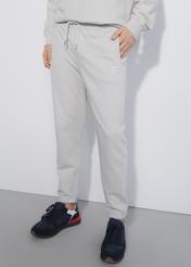 Kremowe spodnie dresowe męskie SPOMT-0085-66(W23)
