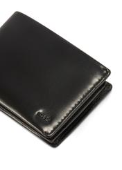 Czarny skórzany portfel damski PORES-0976-99(Z25), zbliżenie na detal produktu, widok na białym tle.