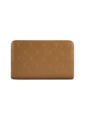 Beżowy portfel damski z monogramem POREC-0348A-81(Z25), widok produktu z tyłu na białym tle.