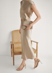 Złote sandały damskie na szpilce BUTYD-1233-2X(W26), widok produktu z boku na stopach modelki.