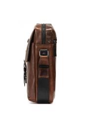 Skórzana brązowa torba męska TORMS-0104-1H(W26), widok produktu z boku na białym tle.
