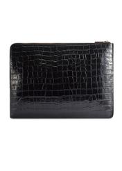 Czarna skórzana teczka damska TORES-0853F-9G(W26) - widok produktu z tyłu, na białym tle. 