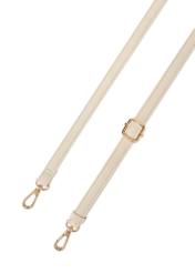 Kremowa średnia torebka damska TOREC-1121-0B(W26), widok na zbliżenie szczegółu na białym tle.