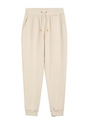 Jasnobeżowe spodnie damskie SPODT-0108-1A(W26), widok produktu z przodu na białym tle.