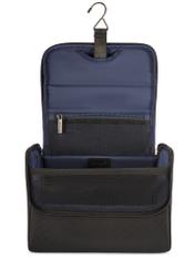 Duża czarna kosmetyczka męska TORMN-0405-99(W26), widok produktu od środka na białym tle.