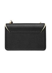 Niewielka czarna torebka damska TOREC-1015-9J(W26), widok produktu od tyłu na białym tle.