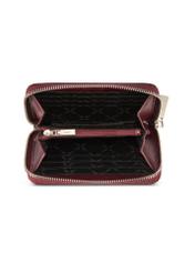 Bordowy skórzany portfel damski PORES-0976-49(Z25), widok produktu od góry na białym tle.