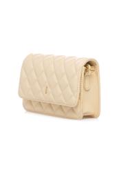 Żółta mała pikowana torebka damska TOREC-1033-2A(W26), widok produktu skosem na białym tle.