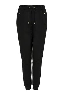 Czarne dresowe spodnie damskie SPODT-0081A-99(W24)