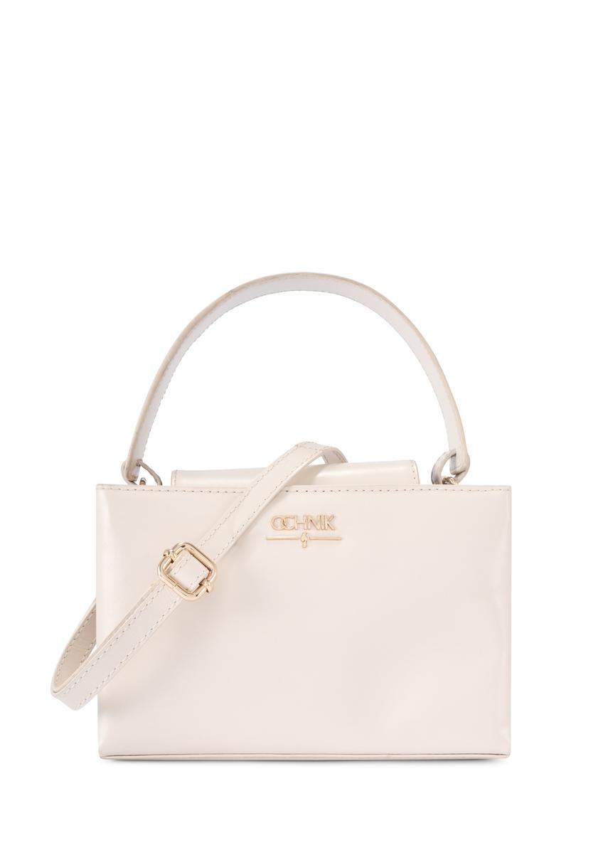 Skórzana kremowa torebka kuferek TORES-1270-0B(W26), widok produktu z przodu na białym tle.