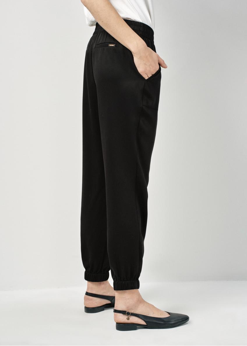 Czarne spodnie damskie ze ściągaczami SPODT-0093-99(W24)