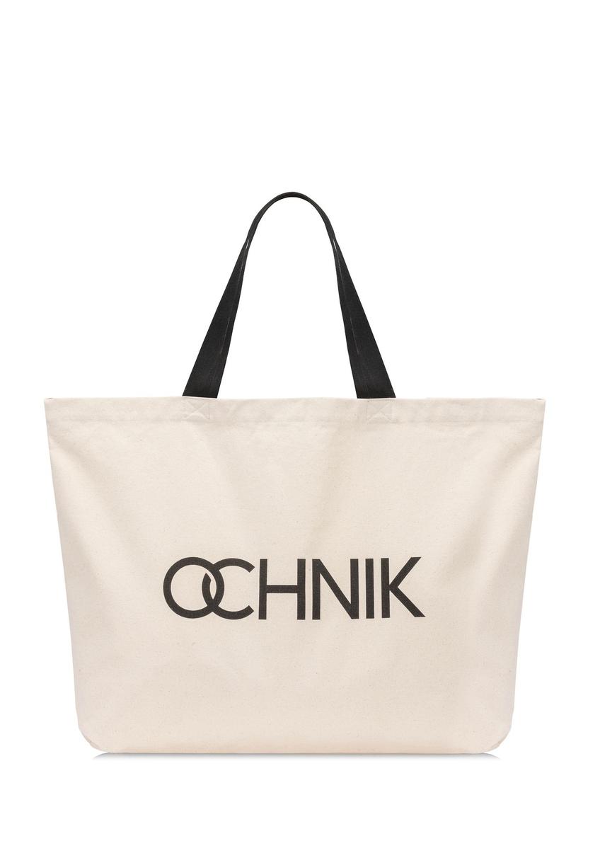 Bawełniana torba w kolorze ecru TOREN-0136-1E(W26) - widok produktu z przodu, na białym tle. 