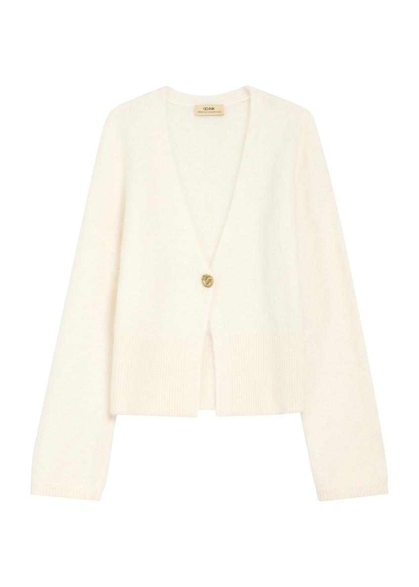 Kremowy wełniany kardigan damski KARDT-0059-12(Z25) - widok produktu z przodu na białym tle. 