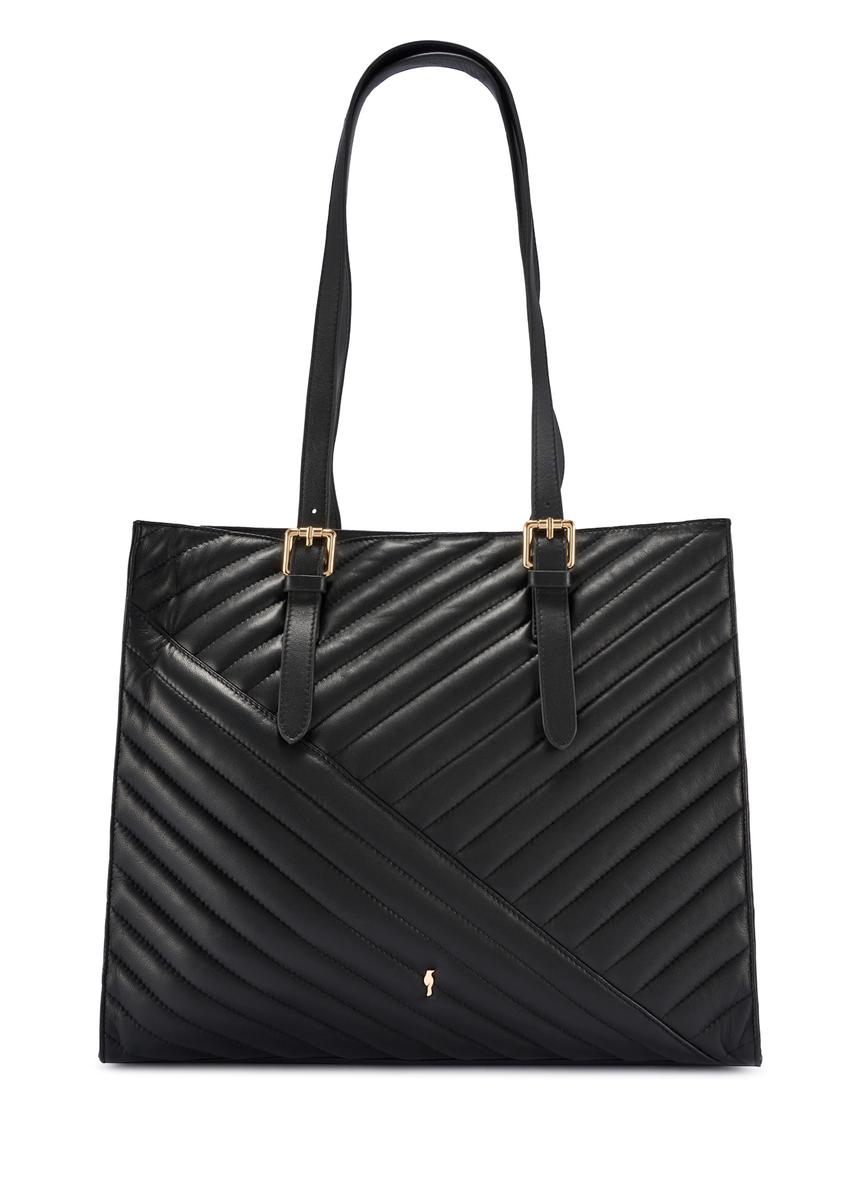 Duża czarna skórzana torebka damska TORES-1287-99(W26), widok produktu z przodu na białym tle.