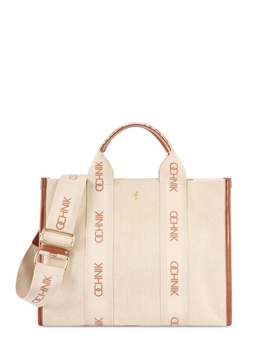 Beżowa damska torebka typu tote bag TOREN-0288A-1E(W26), widok produktu z przodu na białym tle.