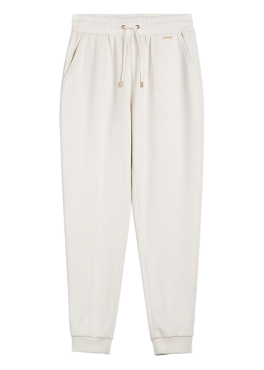 Jasnobeżowe spodnie damskie SPODT-0108-1A(W26)